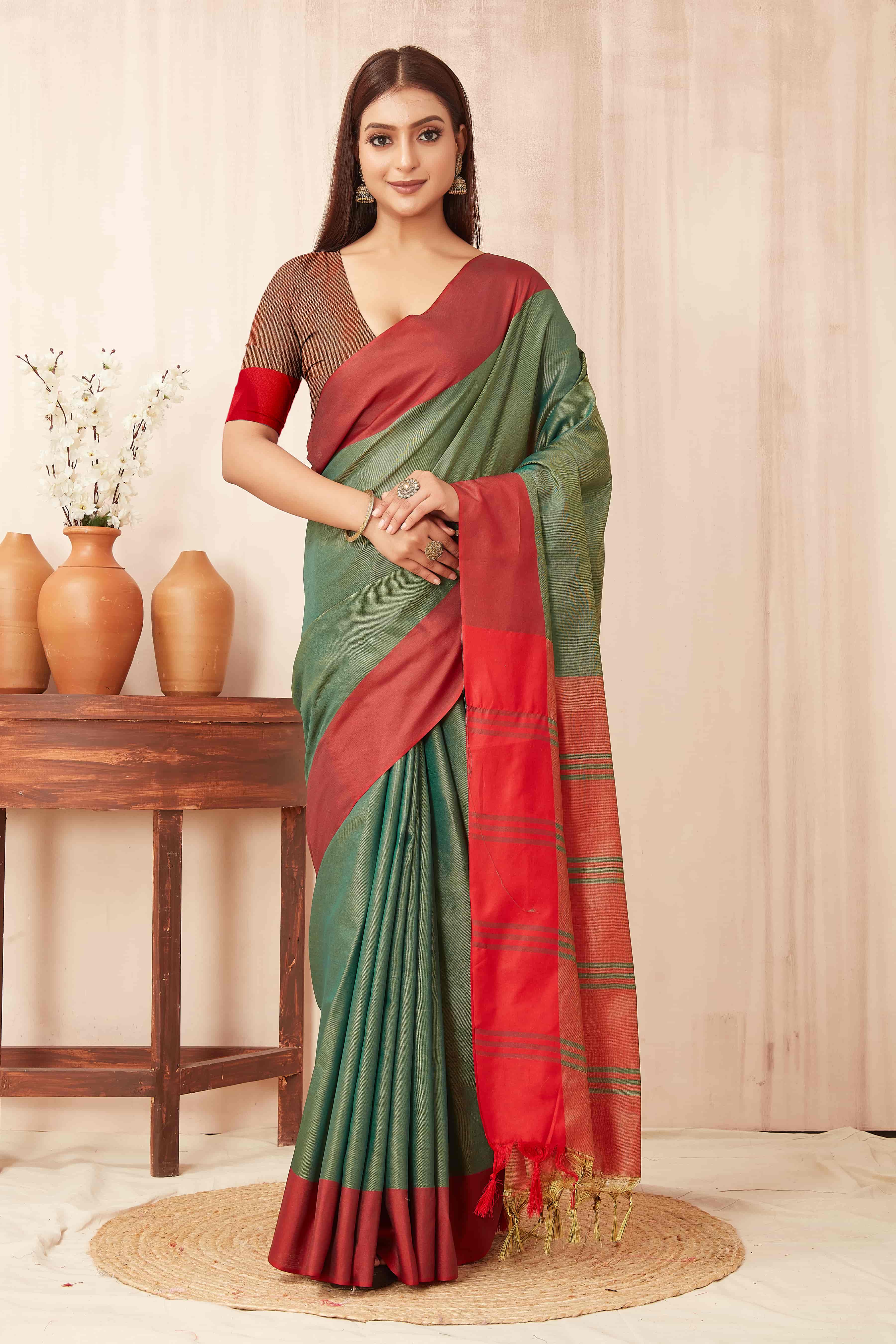 Hiral Fashion Green Banarasi Soft Silk Solid Saree