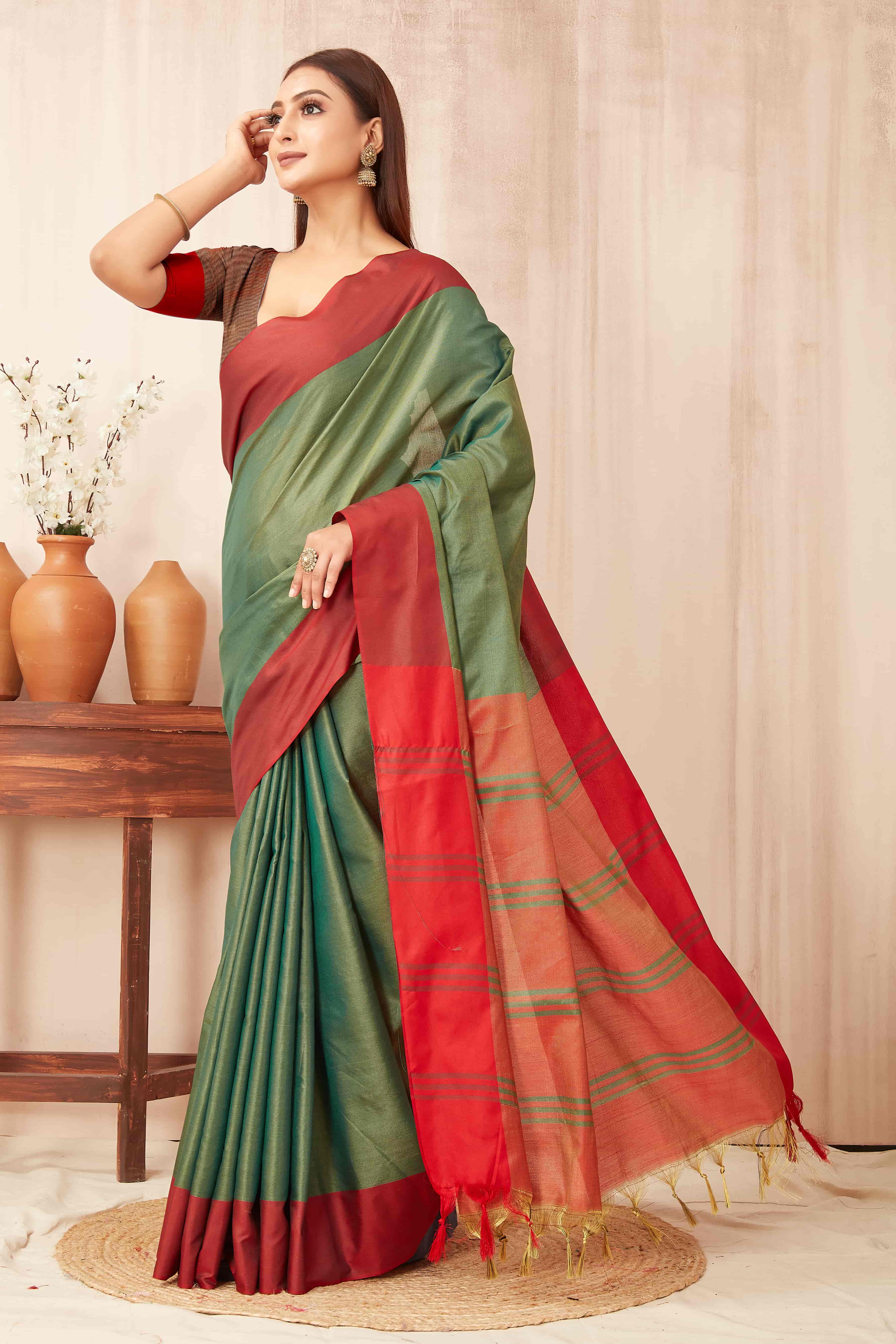 Hiral Fashion Green Banarasi Soft Silk Solid Saree