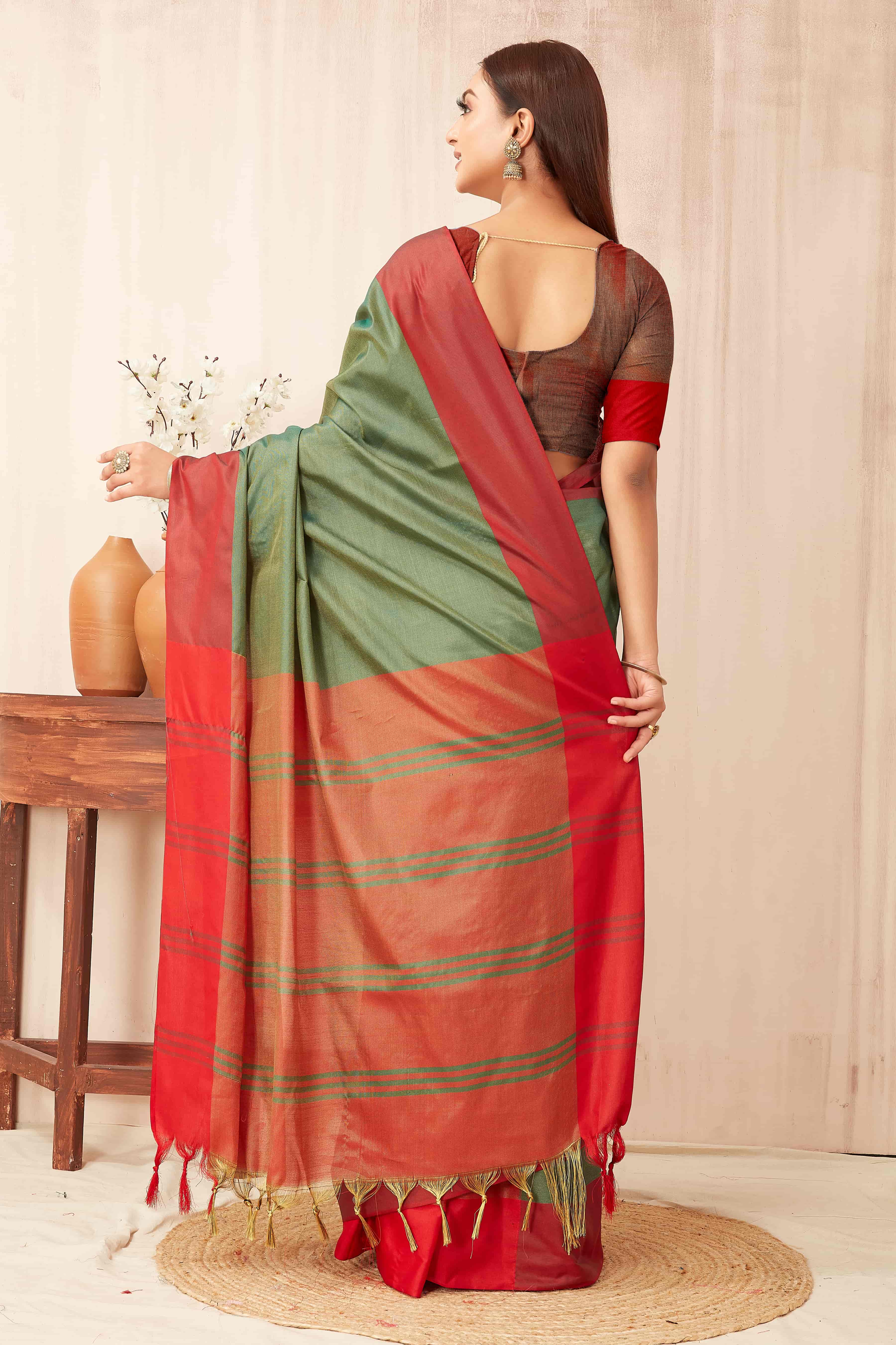 Hiral Fashion Green Banarasi Soft Silk Solid Saree