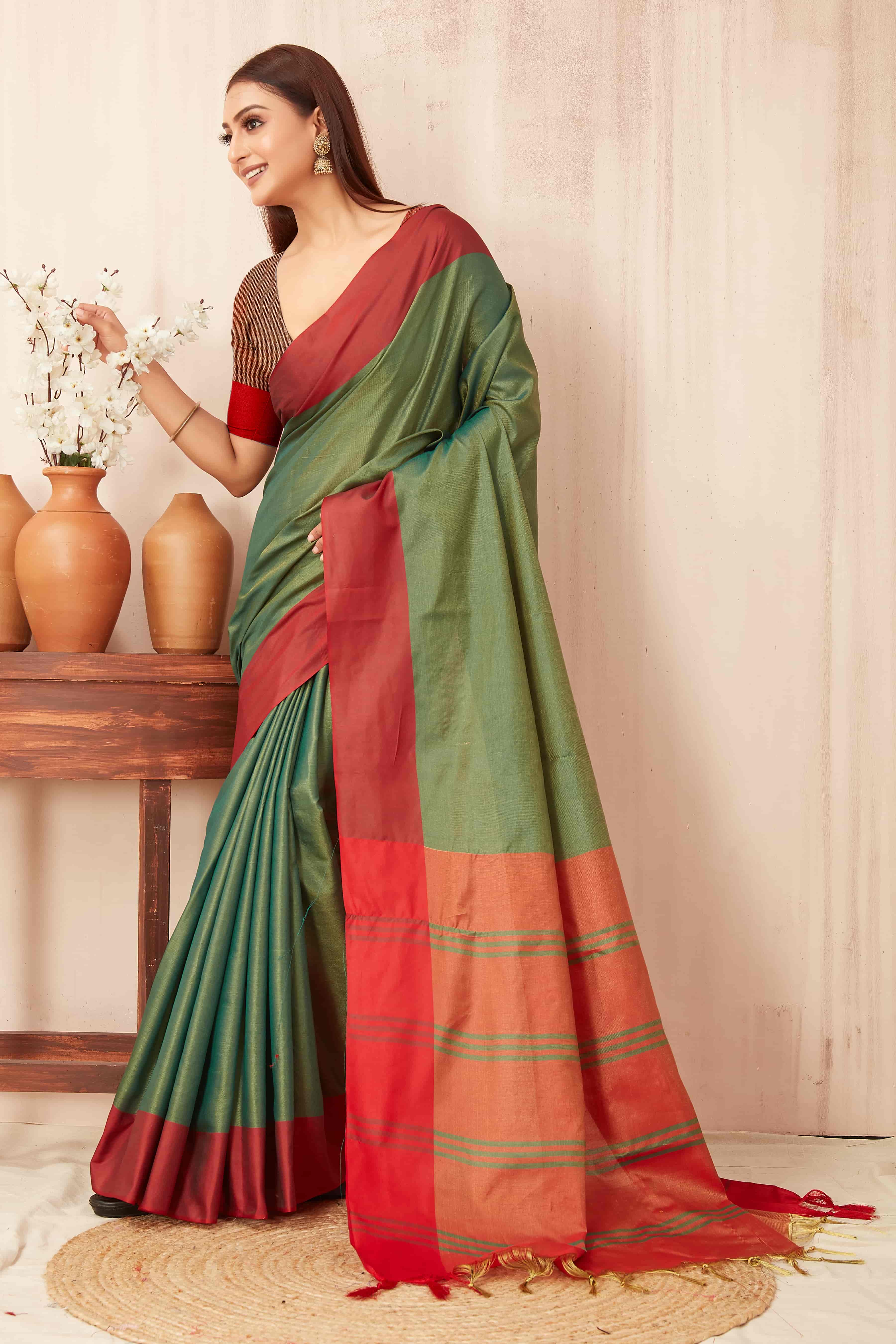 Hiral Fashion Green Banarasi Soft Silk Solid Saree