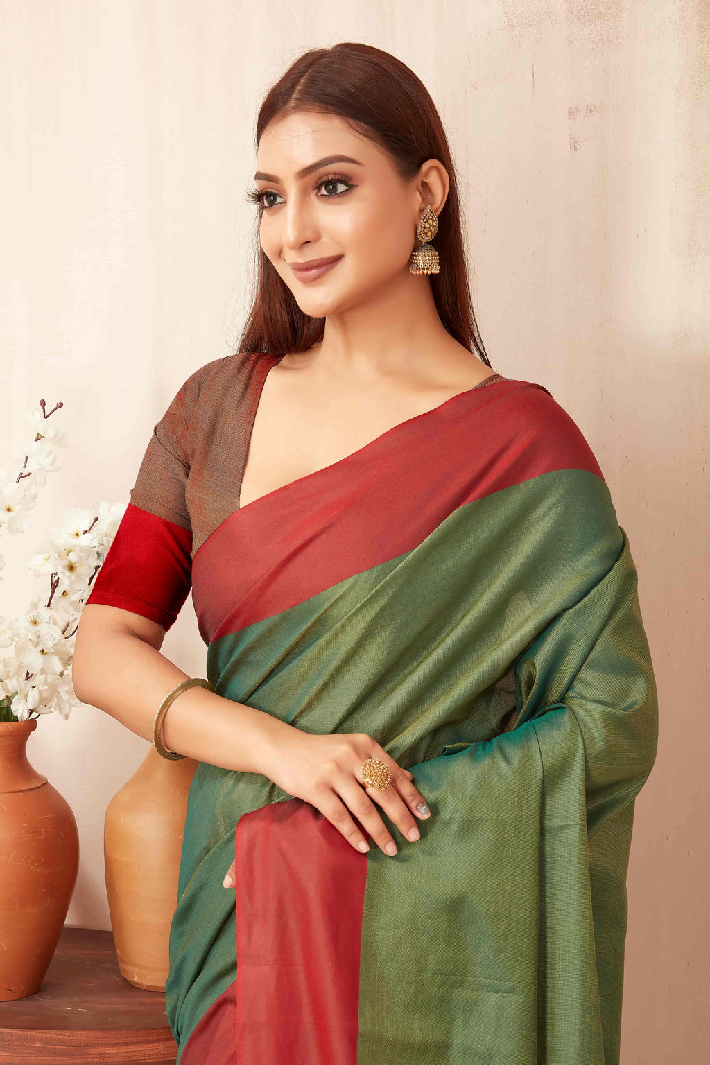 Hiral Fashion Green Banarasi Soft Silk Solid Saree