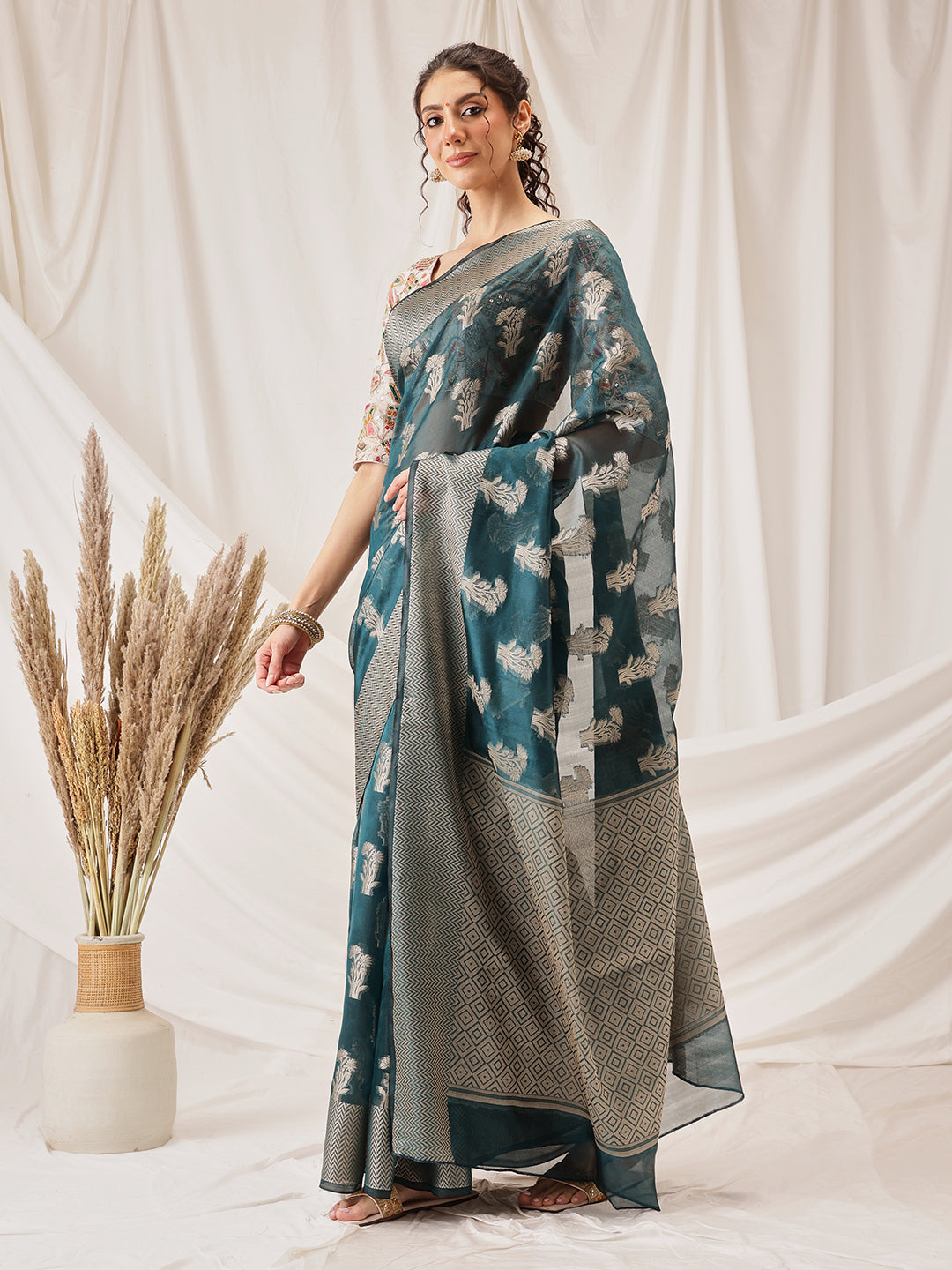 Hiral Fashion Teal Banarasi Organza Silk Floral Woven Design Saree