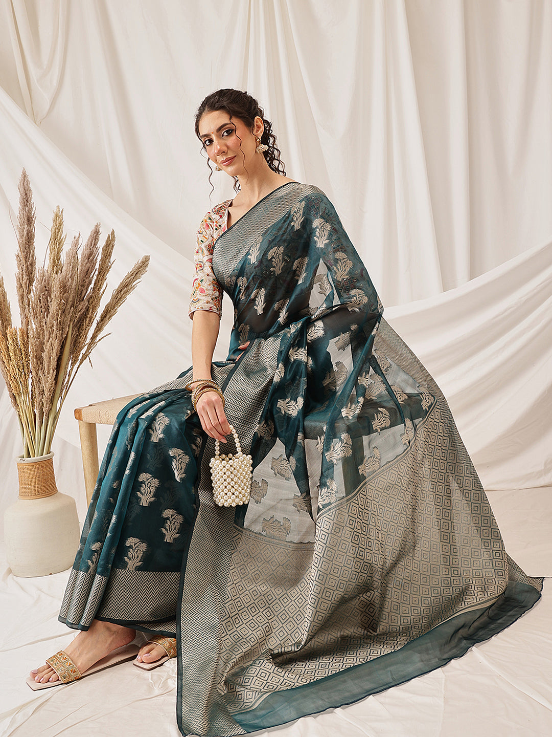 Hiral Fashion Teal Banarasi Organza Silk Floral Woven Design Saree
