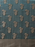 Hiral Fashion Teal Banarasi Organza Silk Floral Woven Design Saree