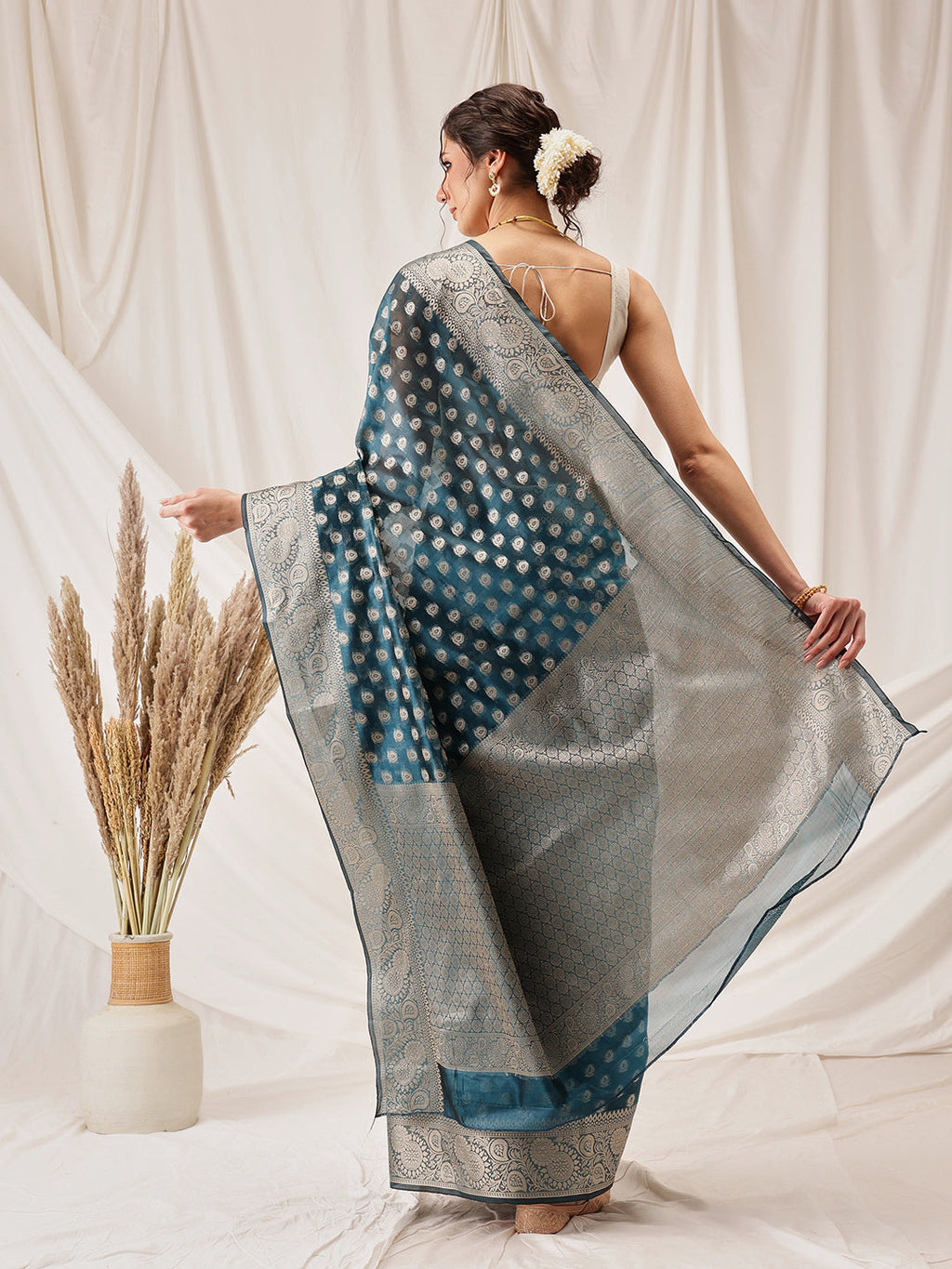 Hiral Fashion Teal Banarasi Organza Silk Floral Woven Design Saree
