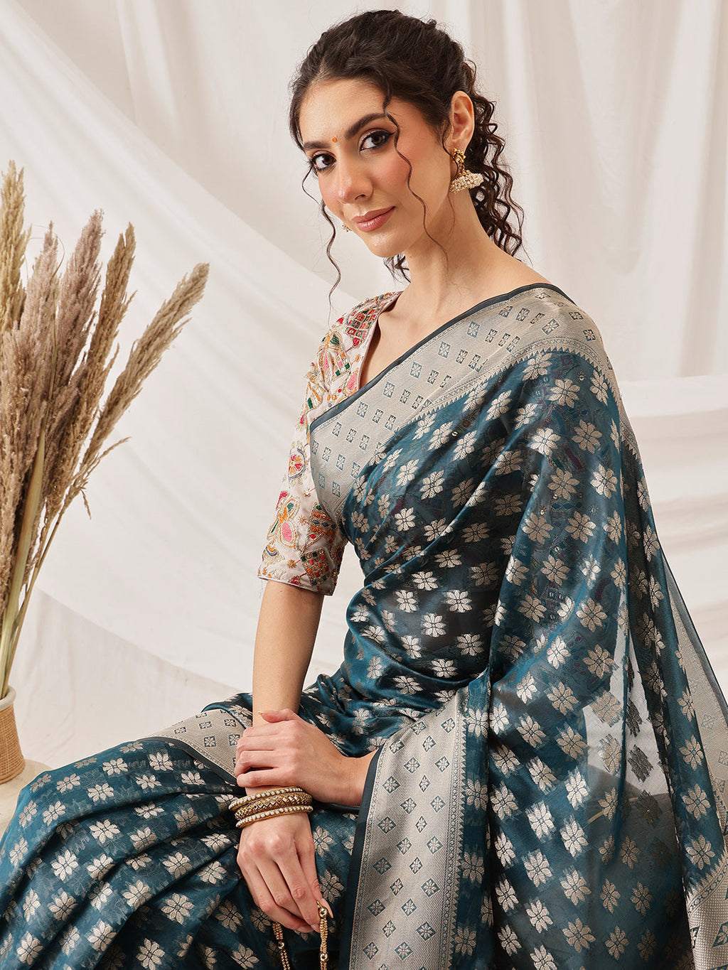 Hiral Fashion Teal Banarasi Organza Silk Floral Woven Design Saree