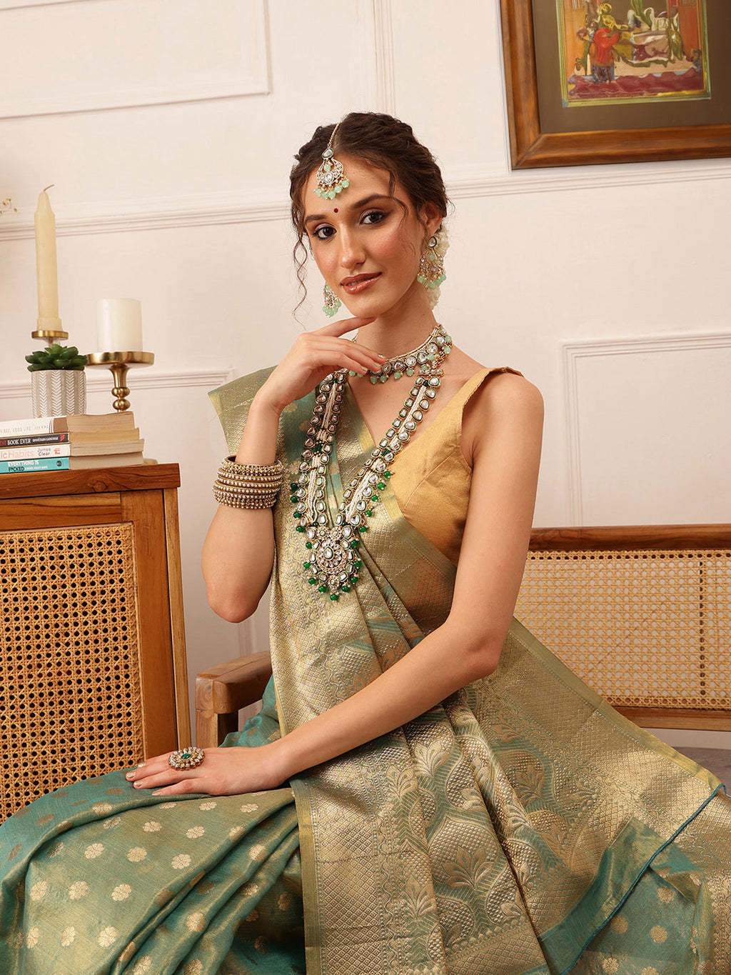 Hiral Fashion Teal Kanjivaram Tissue Silk Floral Zari Woven Saree