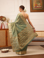 Hiral Fashion Teal Kanjivaram Tissue Silk Floral Zari Woven Saree