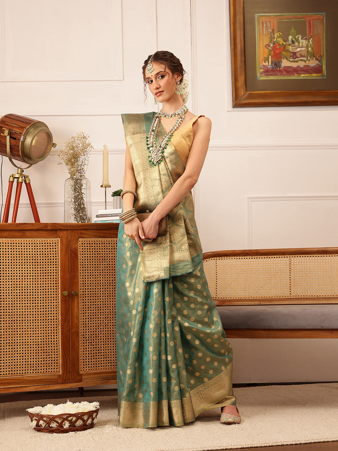 Hiral Fashion Teal Kanjivaram Tissue Silk Floral Zari Woven Saree