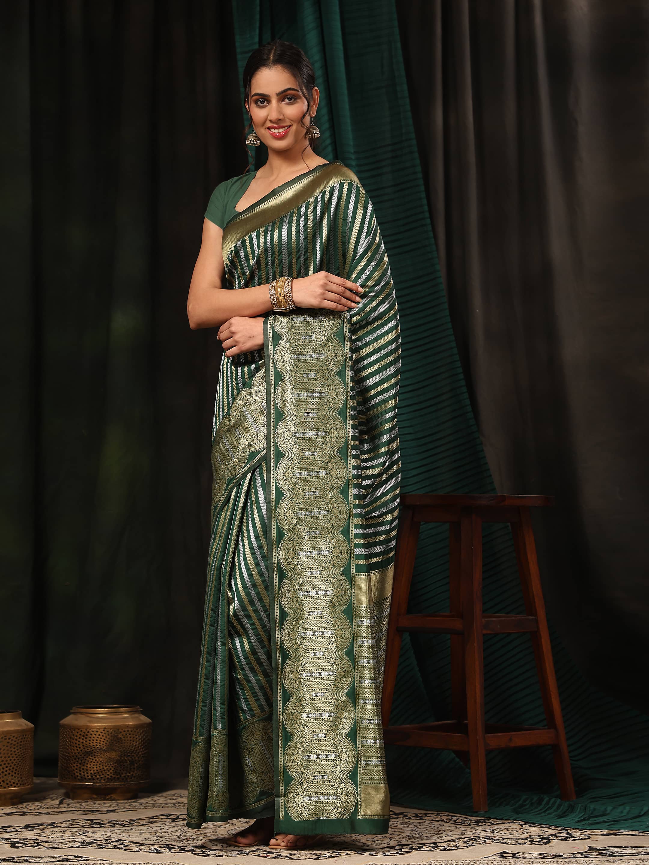 Hiral Fashion Green Banarasi Art Silk Striped Zari Woven Saree