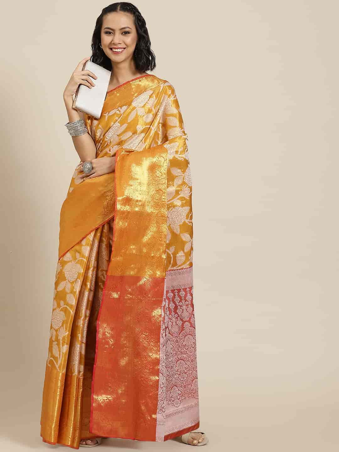 Hiral Fashion Orange Banarasi Tissue Silk Floral Zari Woven Saree