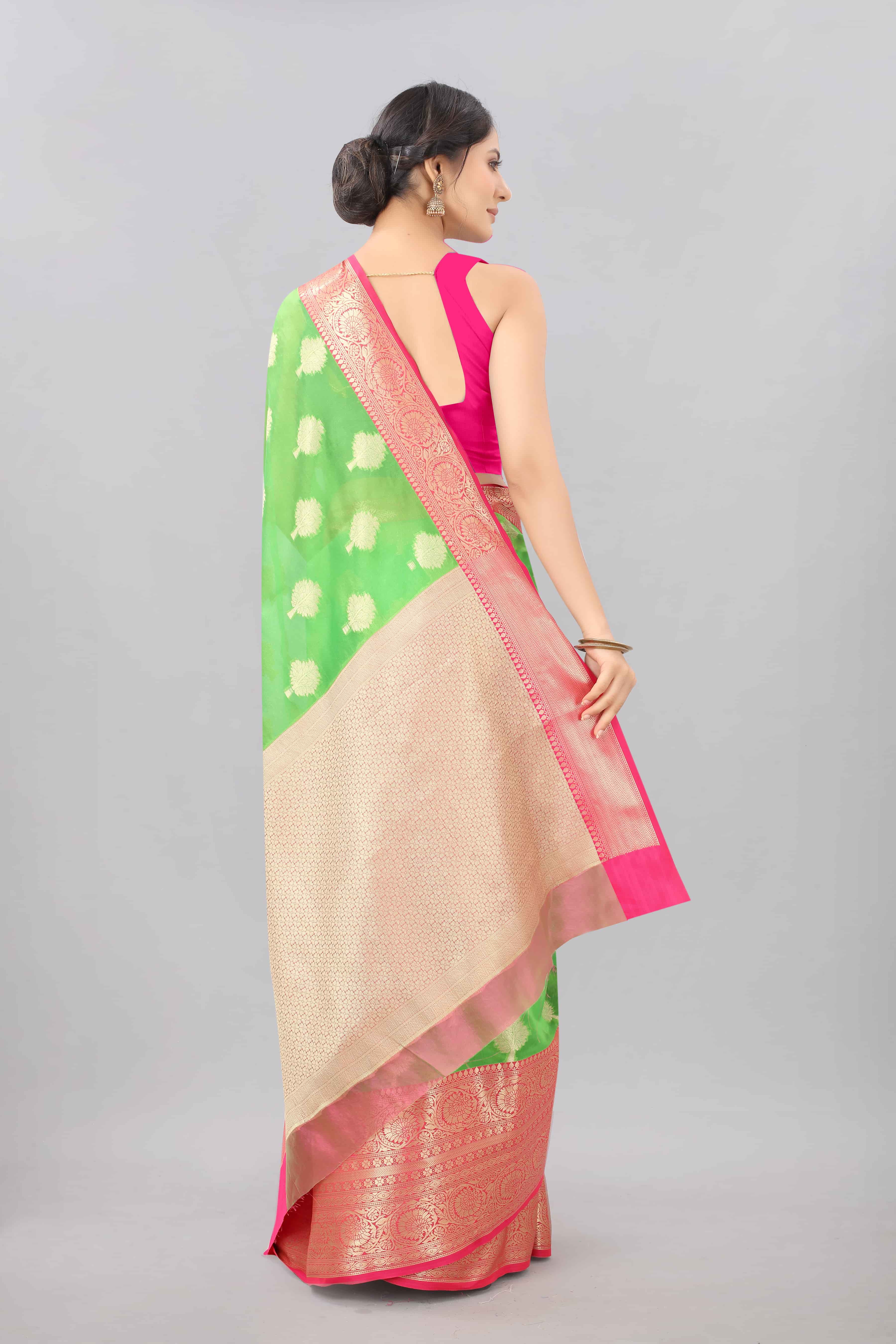 Hiral Fashion Green Banarasi Silk Blend Floral Woven Design Saree