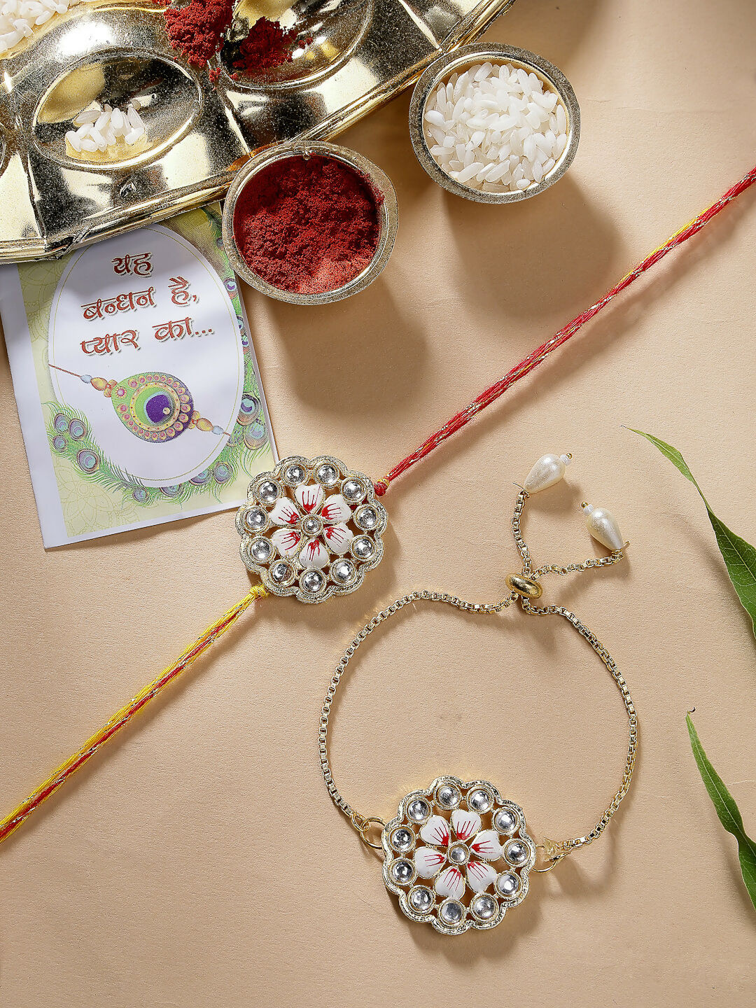 NVR Women & Men Set of 2 Gold Kundan-Studded Bhaiya Bhabhi Rakhi Set With Roli Chawal - Distacart