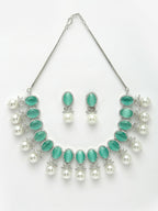 NVR Women's Silver-Plated Green American Diamond Studded Handcrafted Jewellery Set