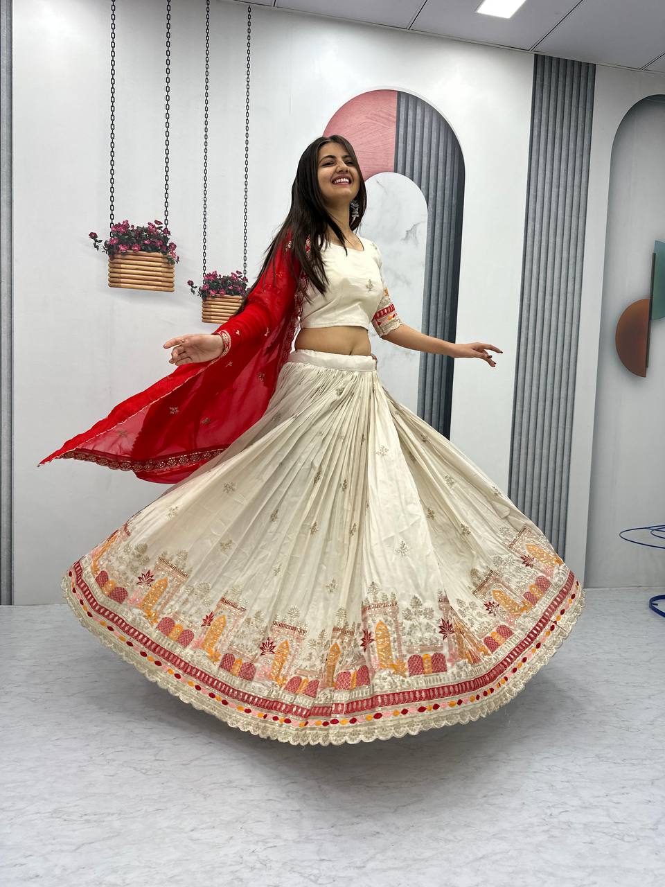 Teeya Creation Cream Color Banarasi Silk Heavy Embroidery Work Fully Stitched Lehenga Choli