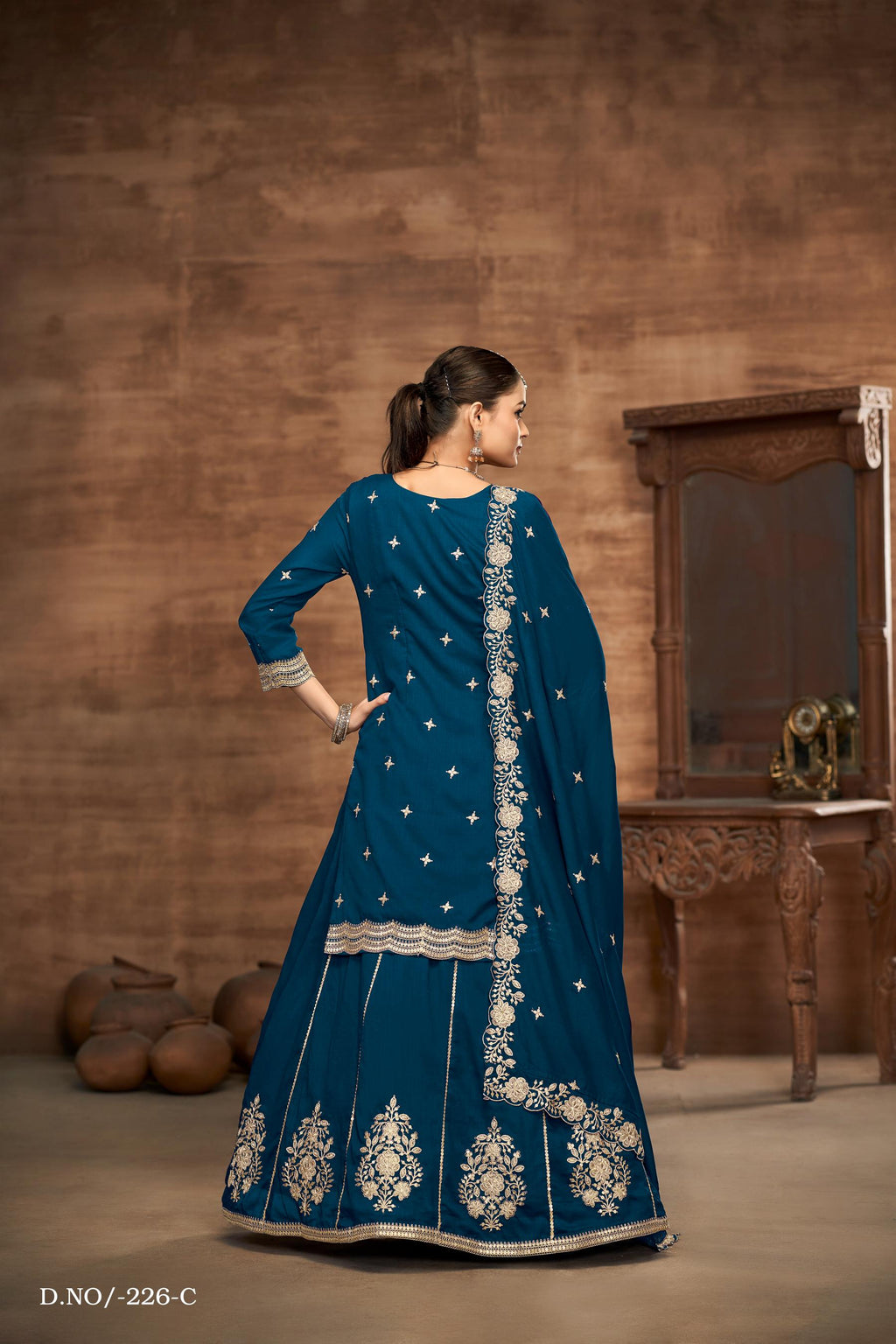 Anaita Teal Premium Embroidered Vichitra Silk Lehenga Style Suit