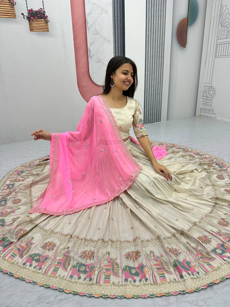 Teeya Creation Cream Color Banarasi Silk Heavy Embroidery Work Fully Stitched Lehenga Choli