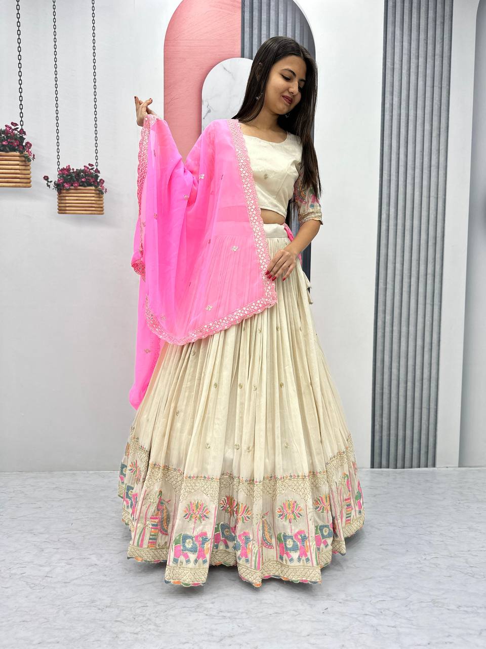 Teeya Creation Cream Color Banarasi Silk Heavy Embroidery Work Fully Stitched Lehenga Choli