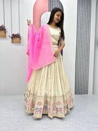 Teeya Creation Cream Color Banarasi Silk Heavy Embroidery Work Fully Stitched Lehenga Choli