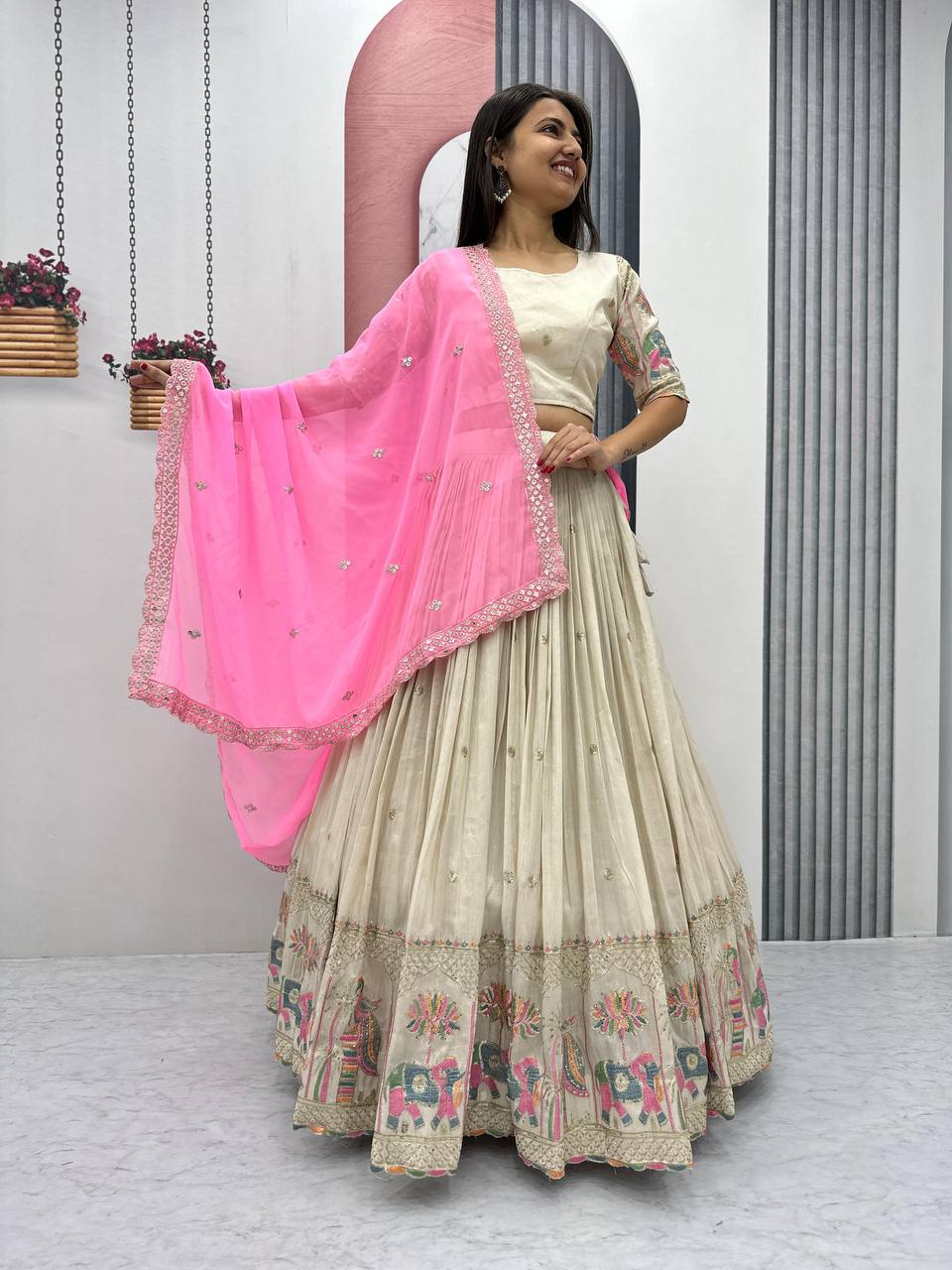 Teeya Creation Cream Color Banarasi Silk Heavy Embroidery Work Fully Stitched Lehenga Choli