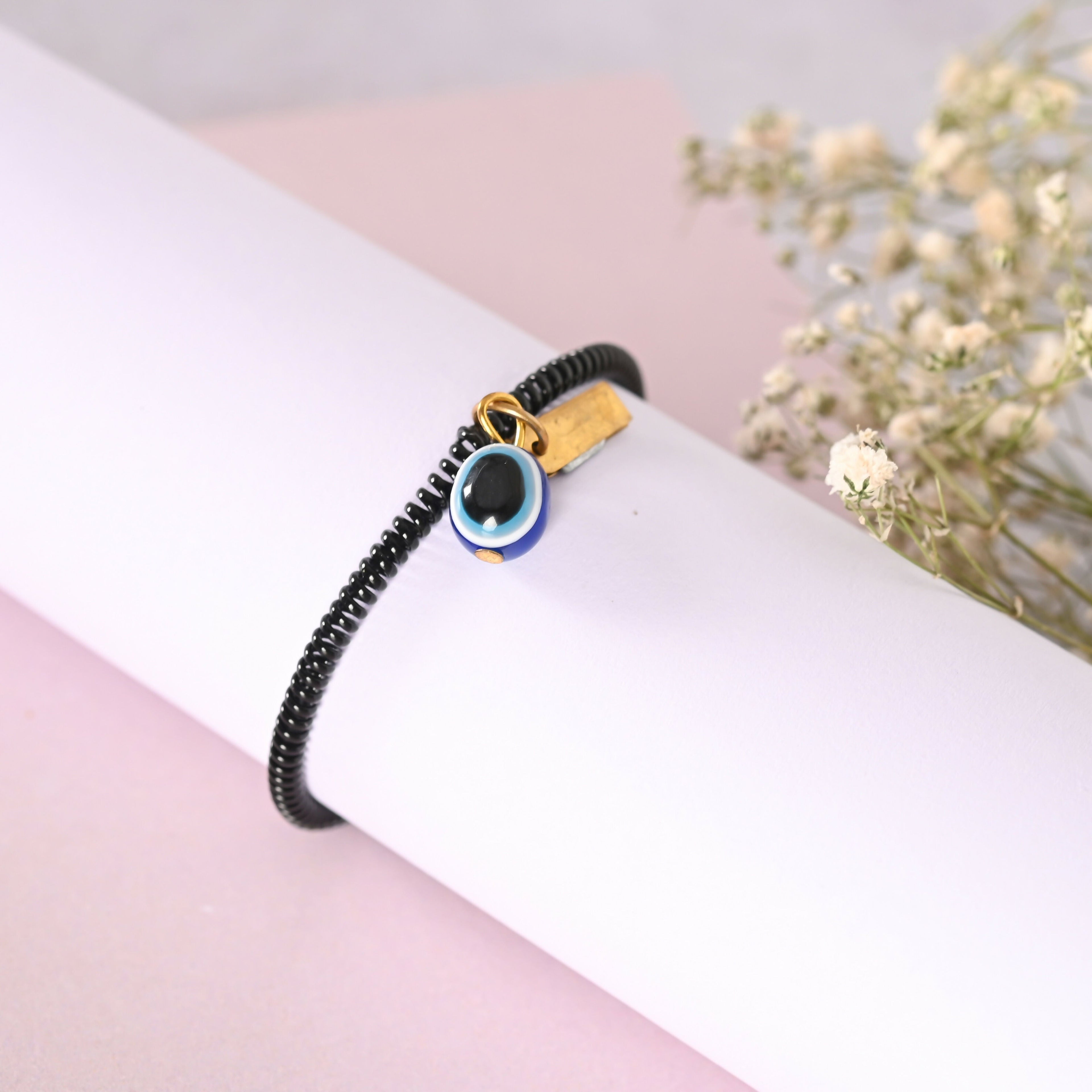 NVR Men & Women Black Evil Eye Crystal Spring Ring Bracelet - Distacart