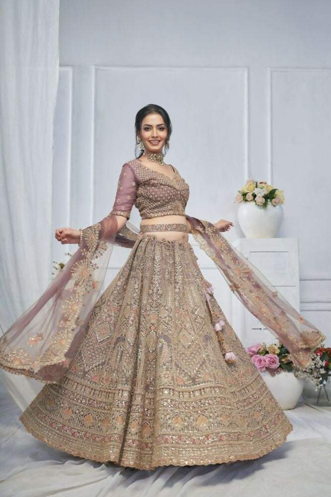 Kesar Fab Purple Net Embroidered Lehenga