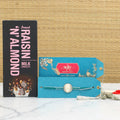 Black Panther Rakhi & Amul Raisin N Almond Chocolate