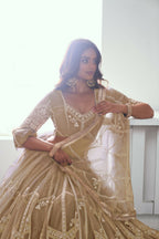 Eilara Charming Beige Thread Work Net Designer Lehenga Choli With Dupatta