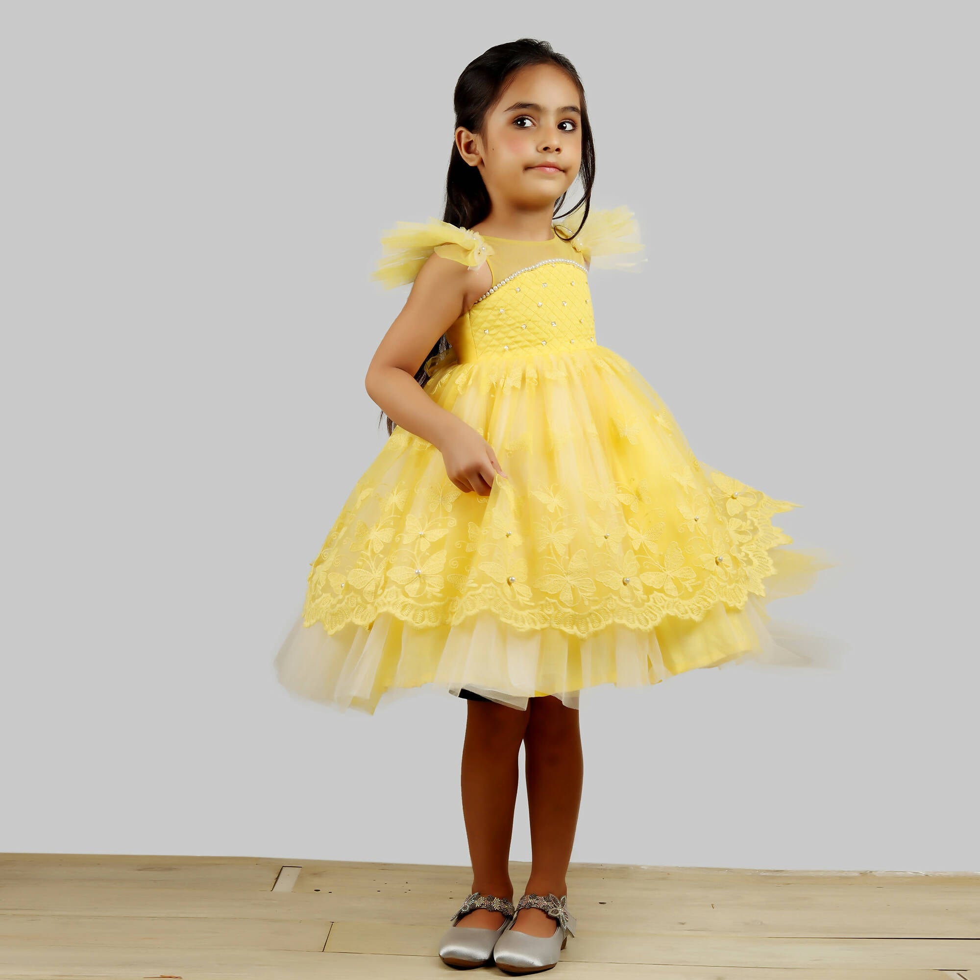 Pink Cow Fashions Yellow Dress With Net Layer At Bottom & Frill Sleeves