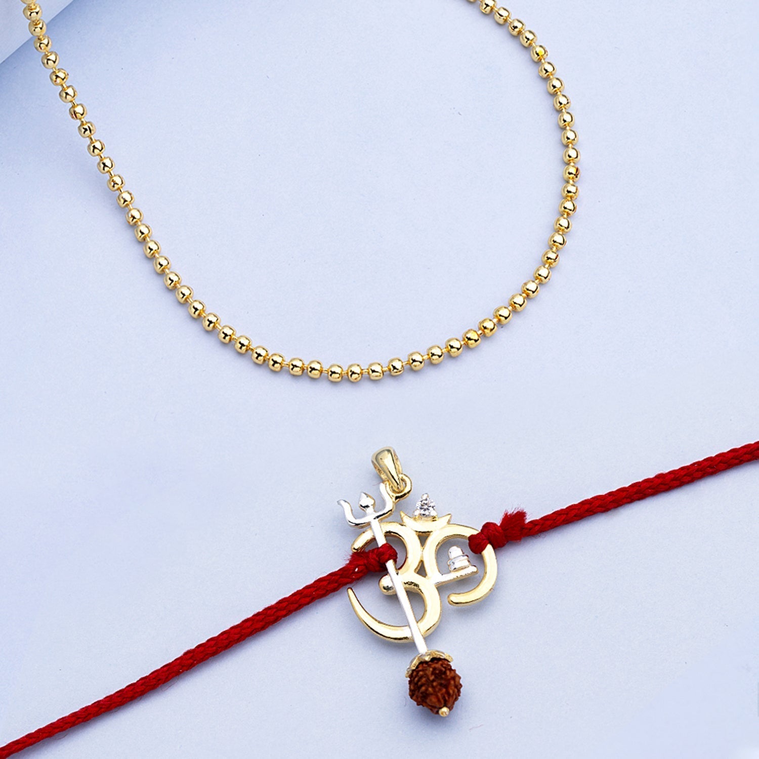 trueBrowns X Voylla OM' Design with Rudraksh Rakhi-Pendant - Distacart