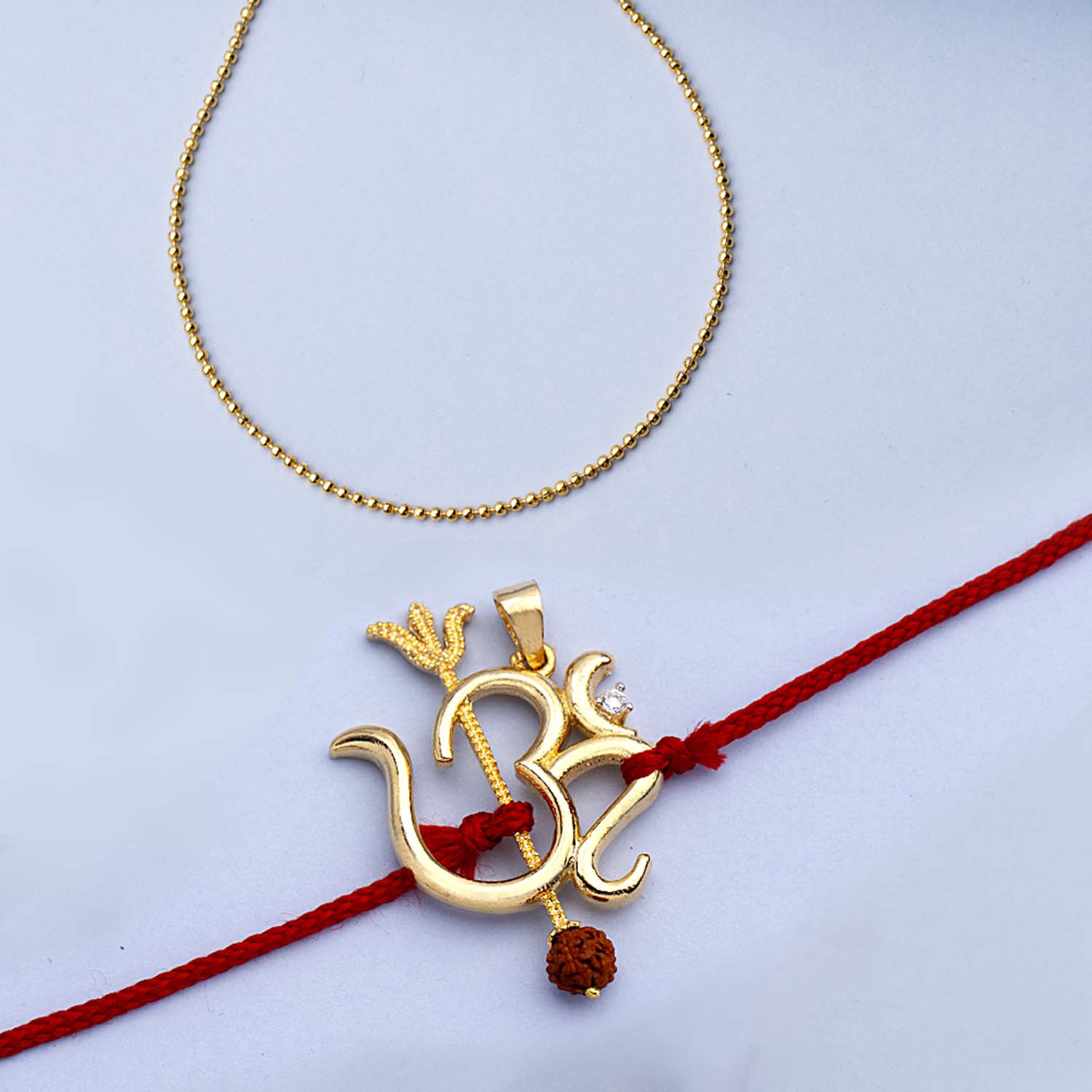 trueBrowns X Voylla Rudraksha Studded 'OM' Rakhi-Pendant - Distacart