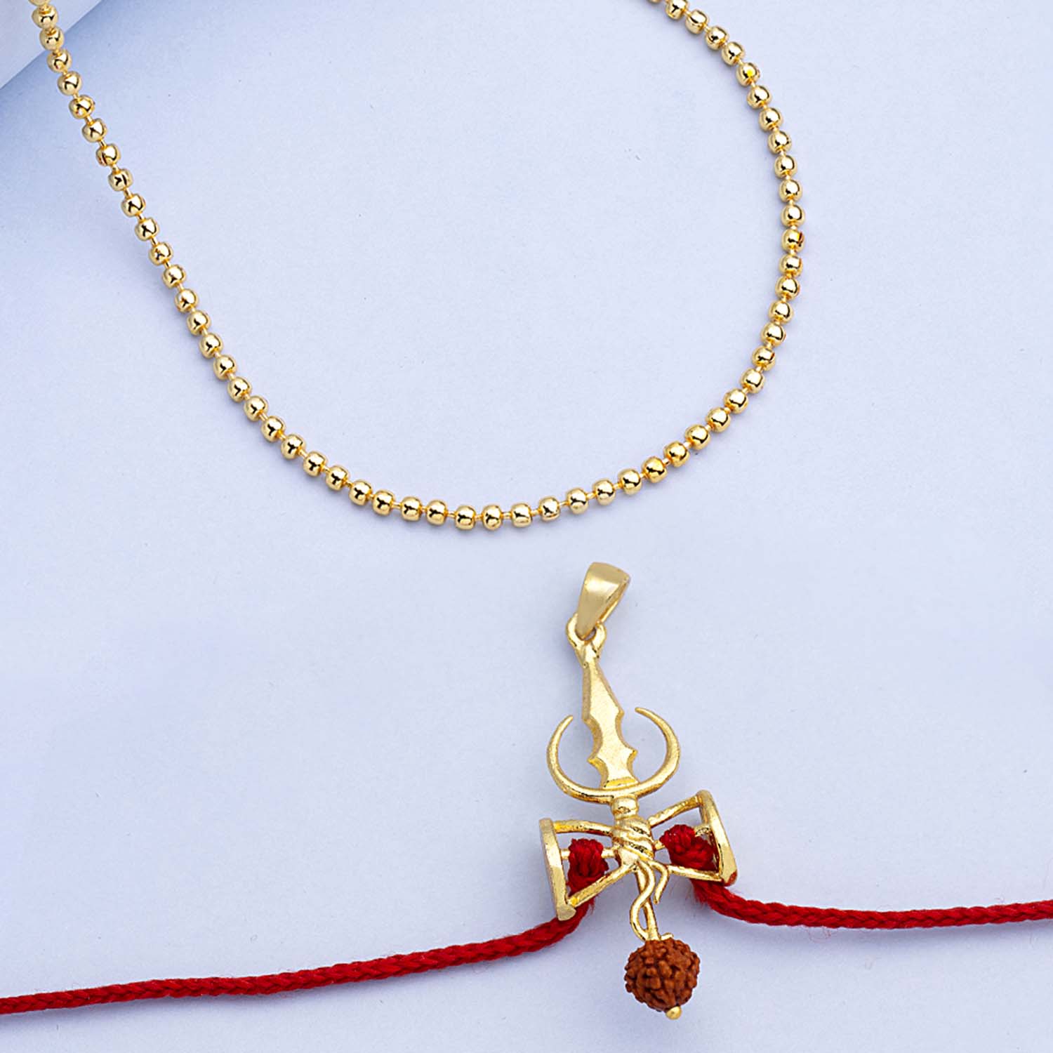 trueBrowns X Voylla Shiva Damru Rudraksha Rakhi-Pendant - Distacart
