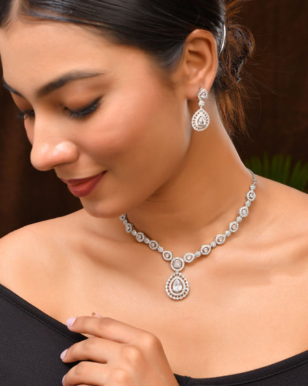 VOJ Silver Plated AD Stone Studded Elegant Necklace And Earrings Set