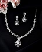 VOJ Silver Plated AD Stone Studded Elegant Necklace And Earrings Set