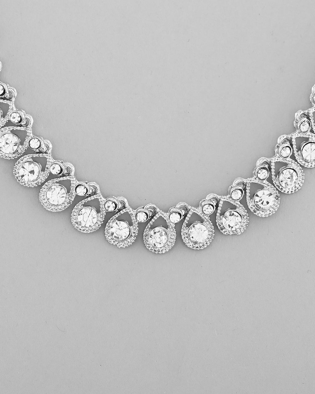 VOJ AD Stone Studded Silver Plated Necklace and Earrings Set