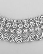 VOJ Silver Plated AD Studded Necklace With Earrings And Mangtikka Set