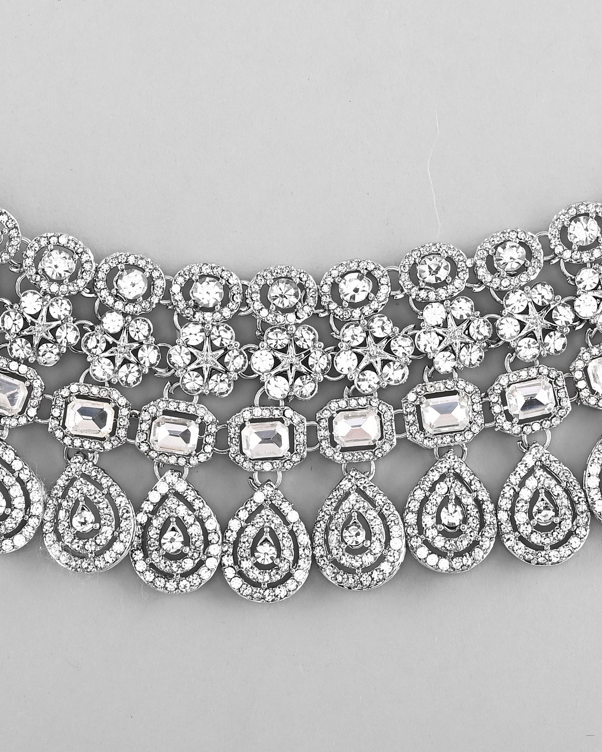 VOJ Silver Plated AD Studded Necklace With Earrings And Mangtikka Set