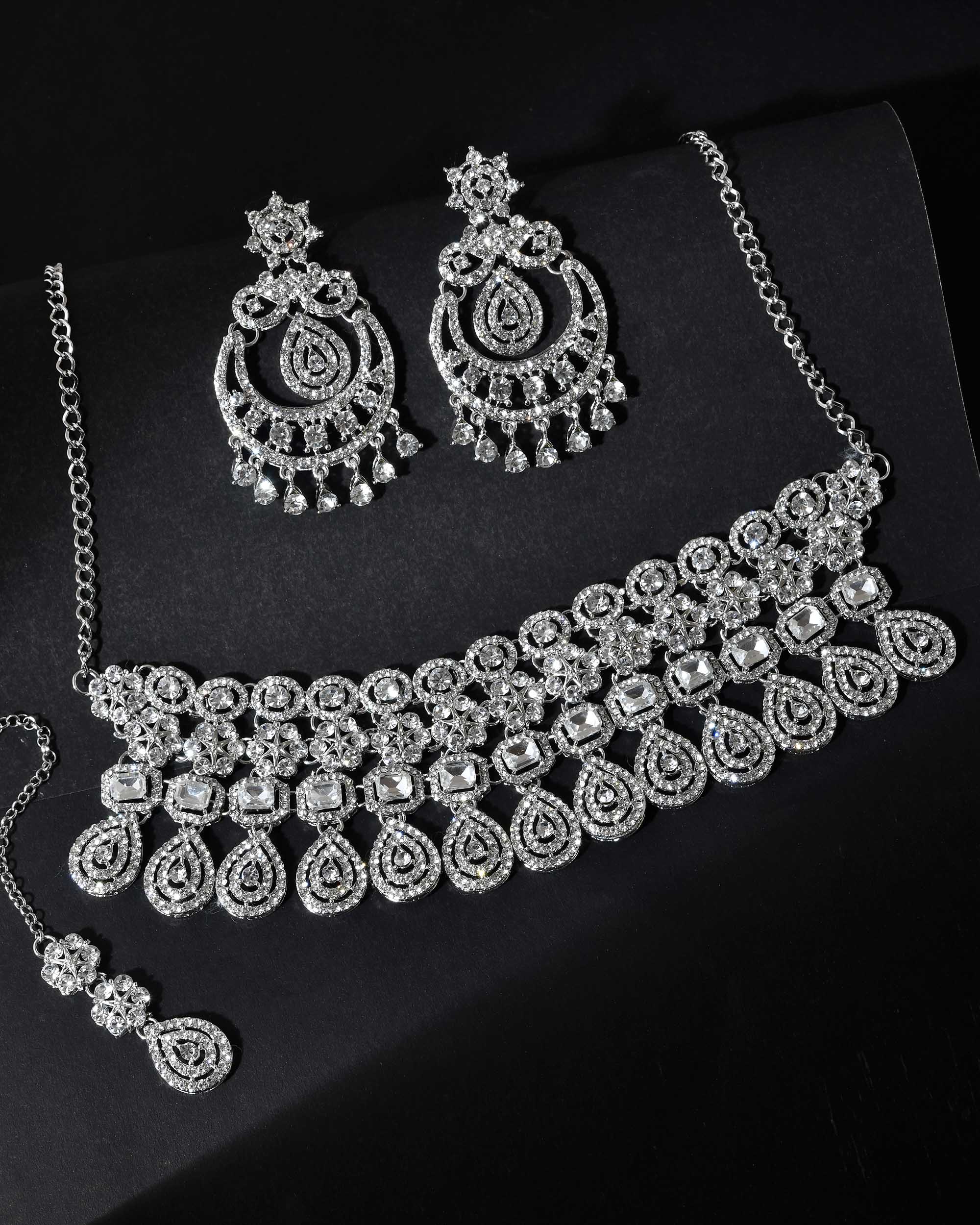 VOJ Silver Plated AD Studded Necklace With Earrings And Mangtikka Set