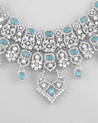 VOJ Silver Plated Designer AD Studded Necklace With Earrings And Mangtikka