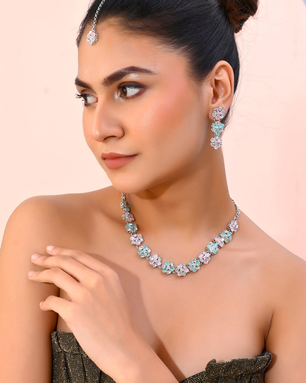 VOJ Silver Plated AD With Nude Green And Light Pink Flower Jewellery Set With Mangtikka