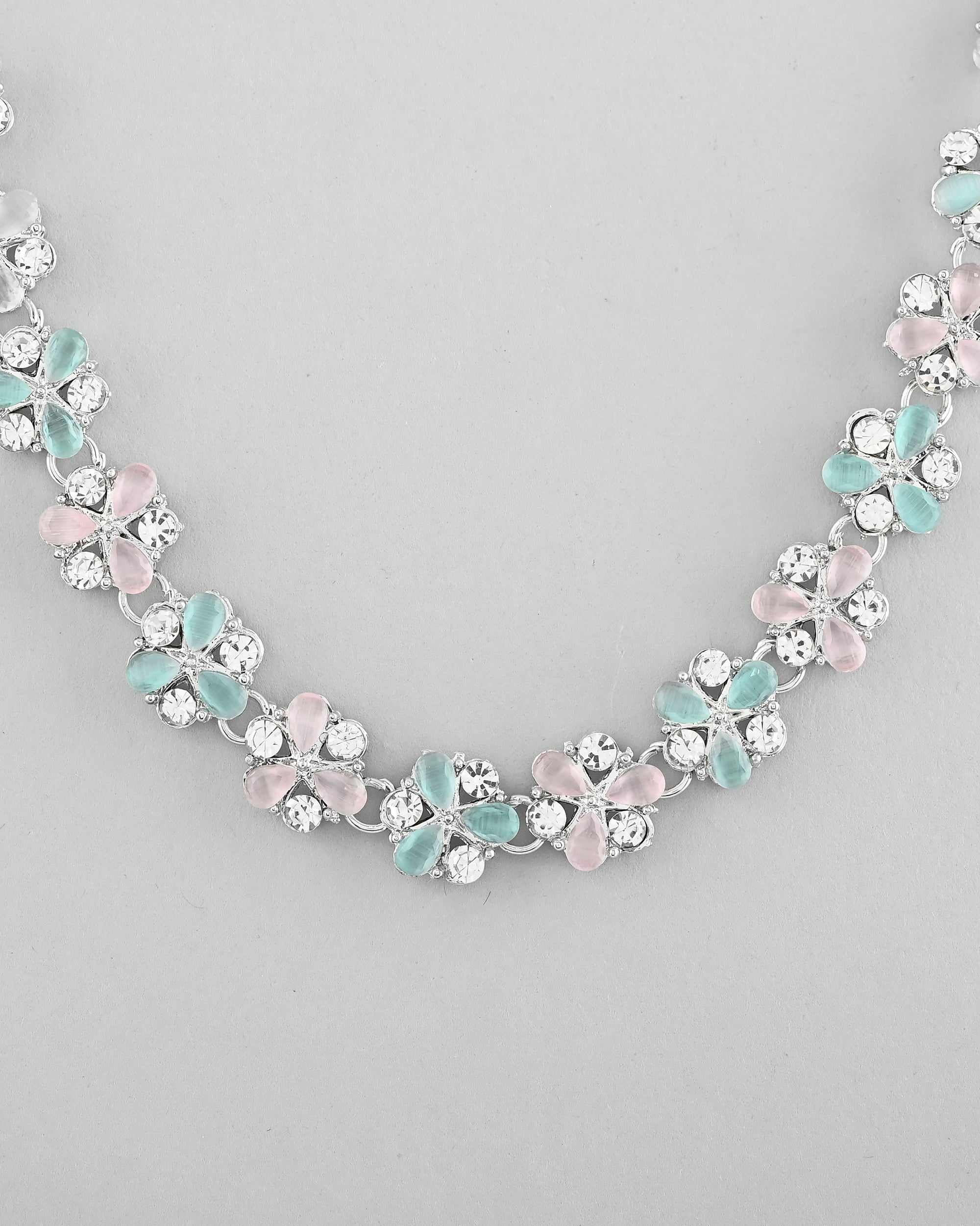 VOJ Silver Plated AD With Nude Green And Light Pink Flower Jewellery Set With Mangtikka