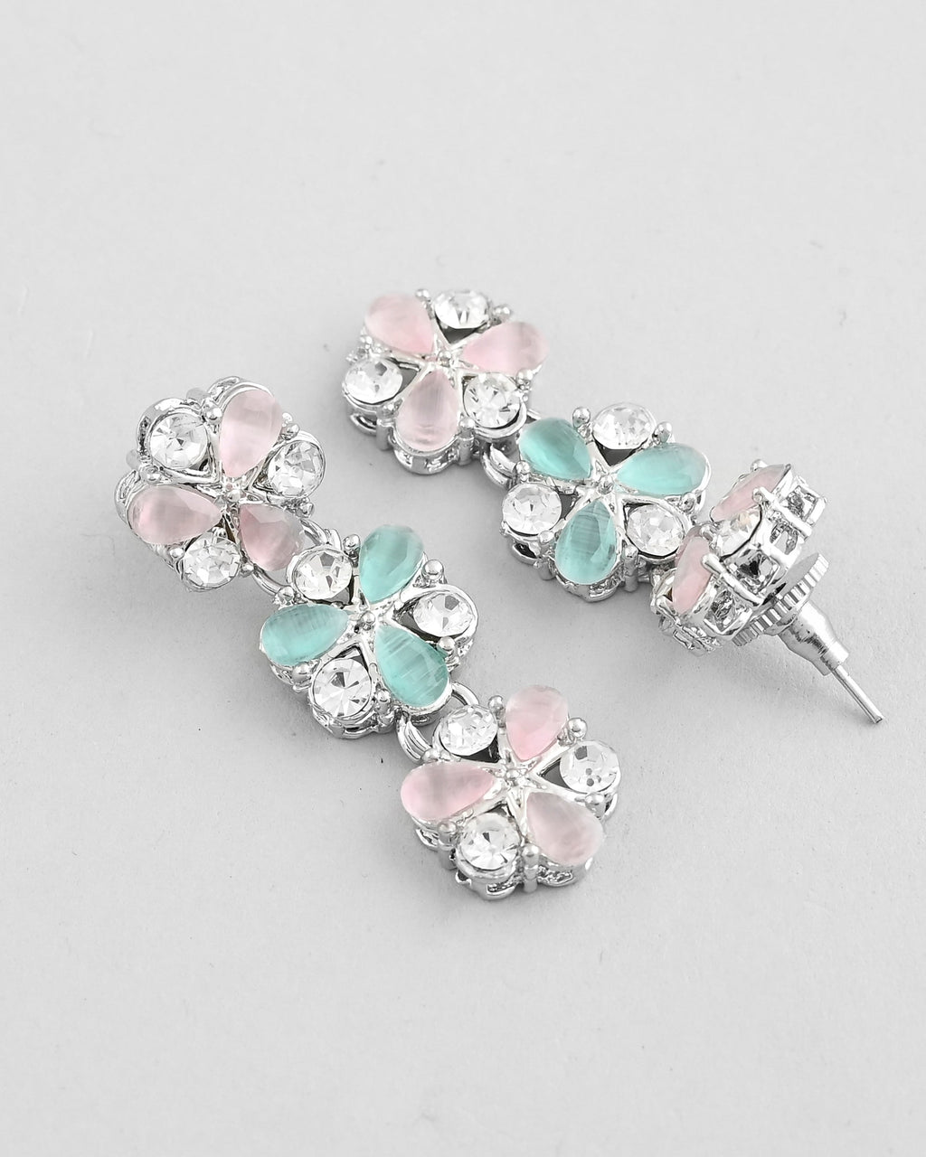 VOJ Silver Plated AD With Nude Green And Light Pink Flower Jewellery Set With Mangtikka