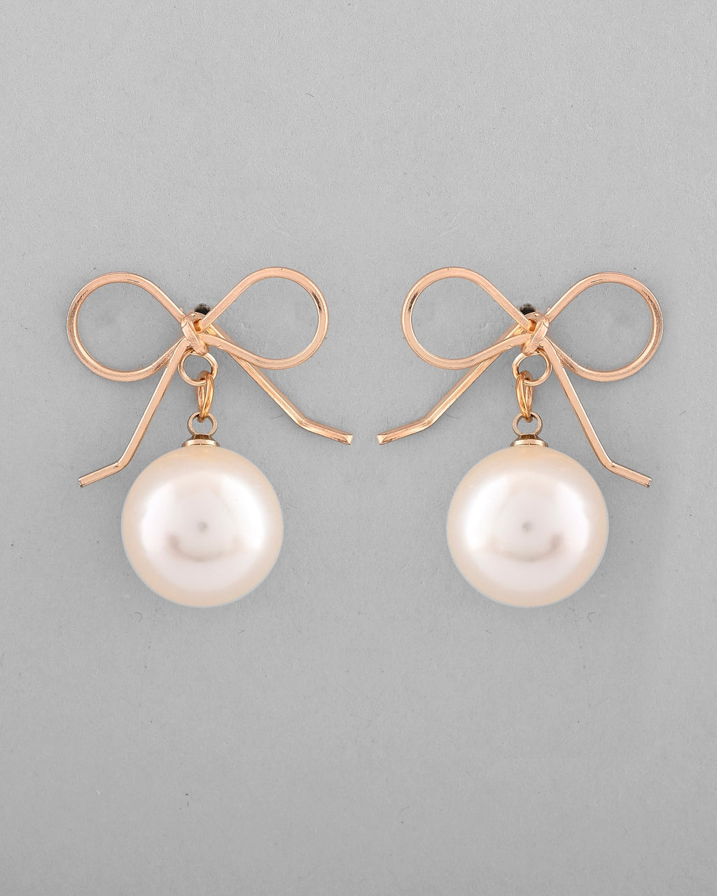 VOJ Gold-Polished Pearl & Bow Shaped Classic Drop Earrings - Distacart