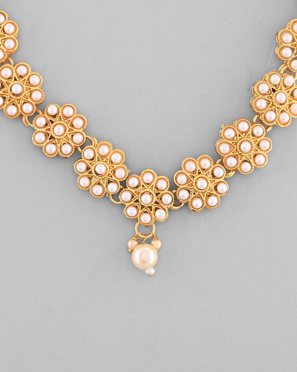 VOJ Gold-Polished Pearl Studded Floral Necklace And Earrings