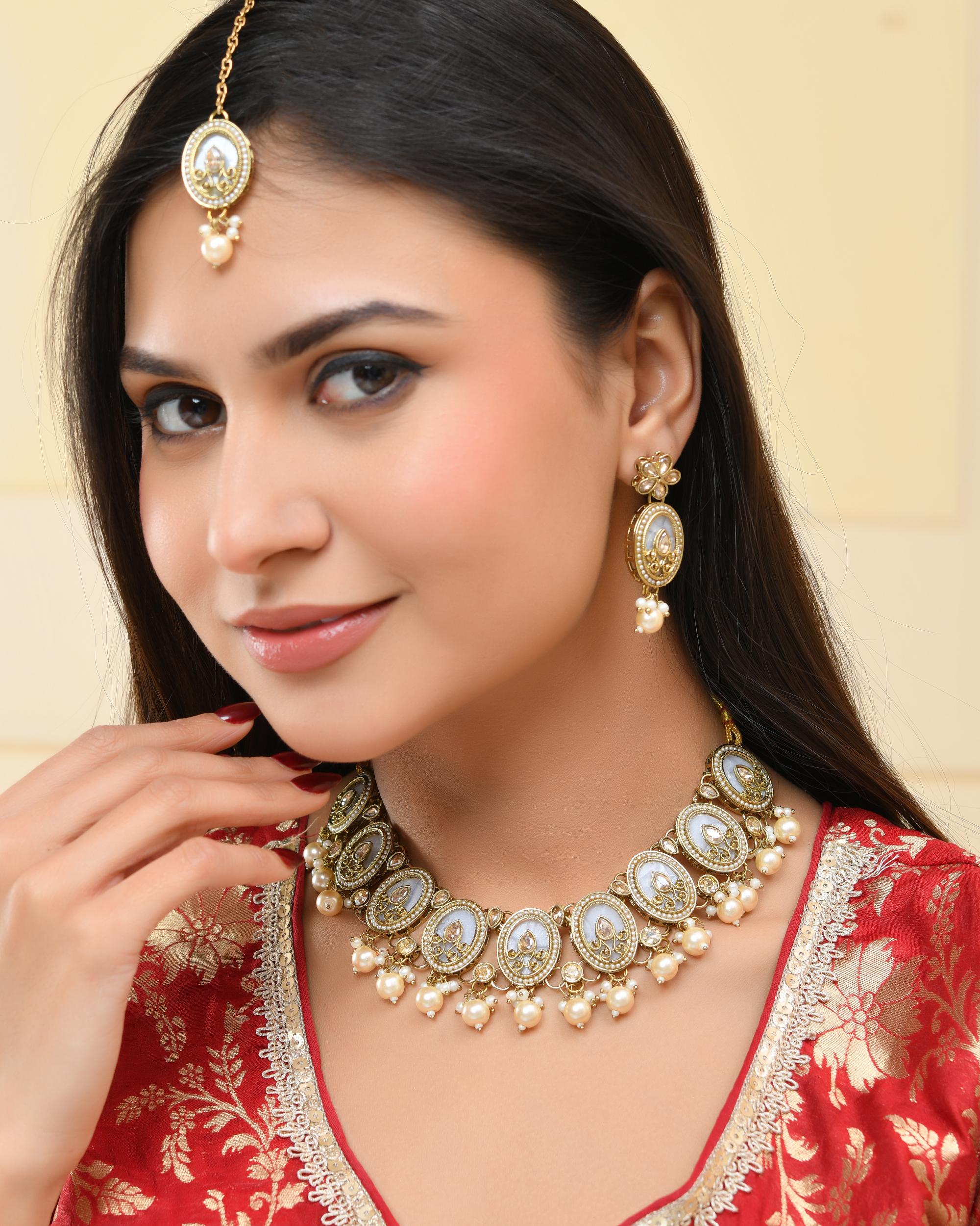 VOJ Gold-Polished Kundan Stone Studded White Necklace With Maang Tikka And Earrings Set