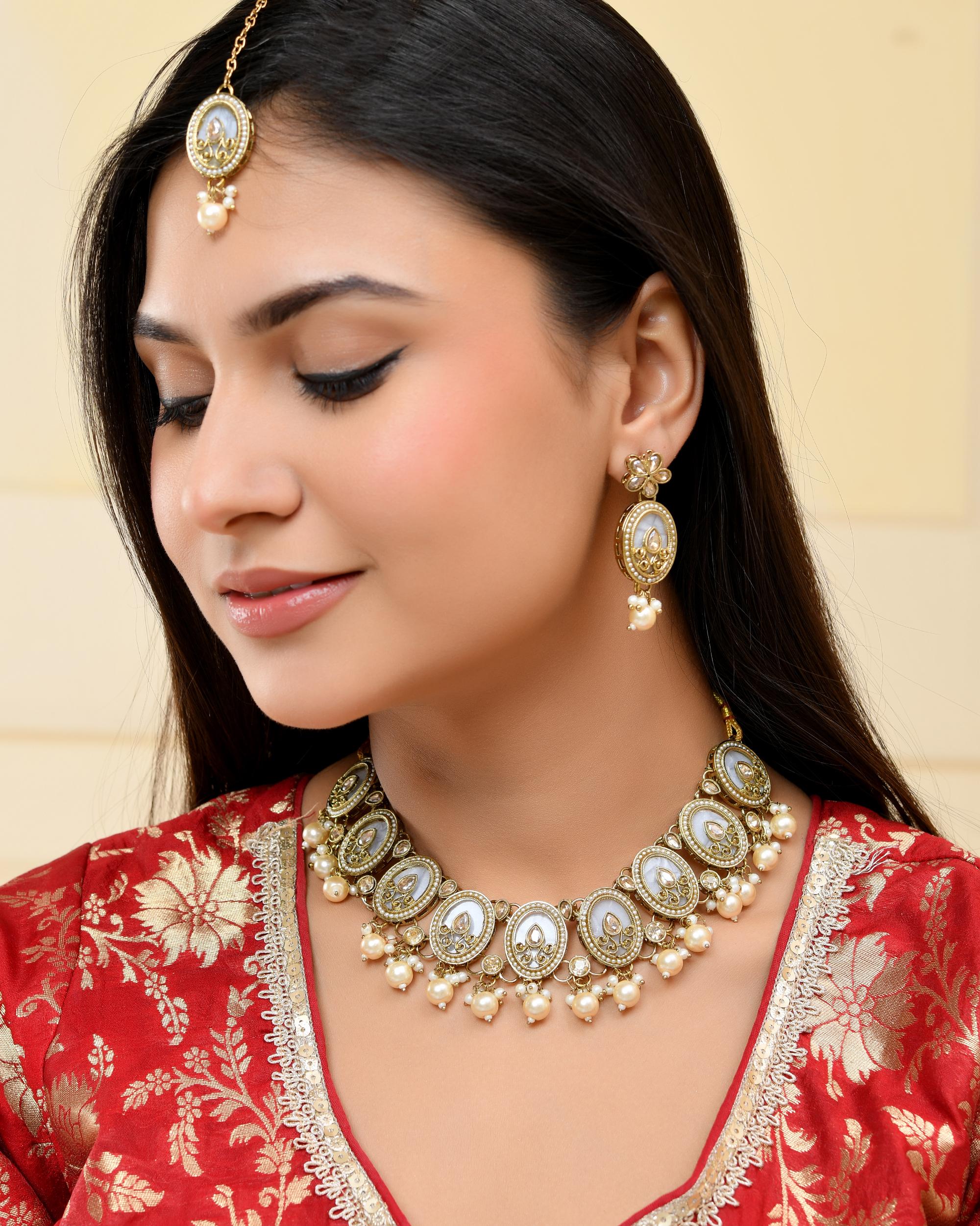 VOJ Gold-Polished Kundan Stone Studded White Necklace With Maang Tikka And Earrings Set