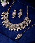 VOJ Gold-Polished Kundan Stone Studded White Necklace With Maang Tikka And Earrings Set