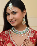 VOJ Gold-Polished White Kundan Stone Studded Choker With Earrings And Maang Tikka Set