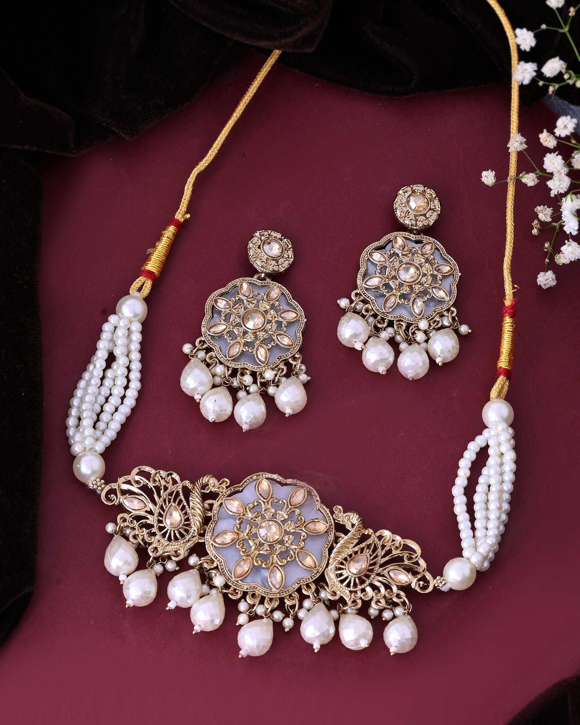 VOJ Gold-Polished Kundan And White Beaded Jewellery Set