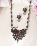 VOJ Silver Plated Peacock Shaped Multi Color Stone Studded Jewellery Set